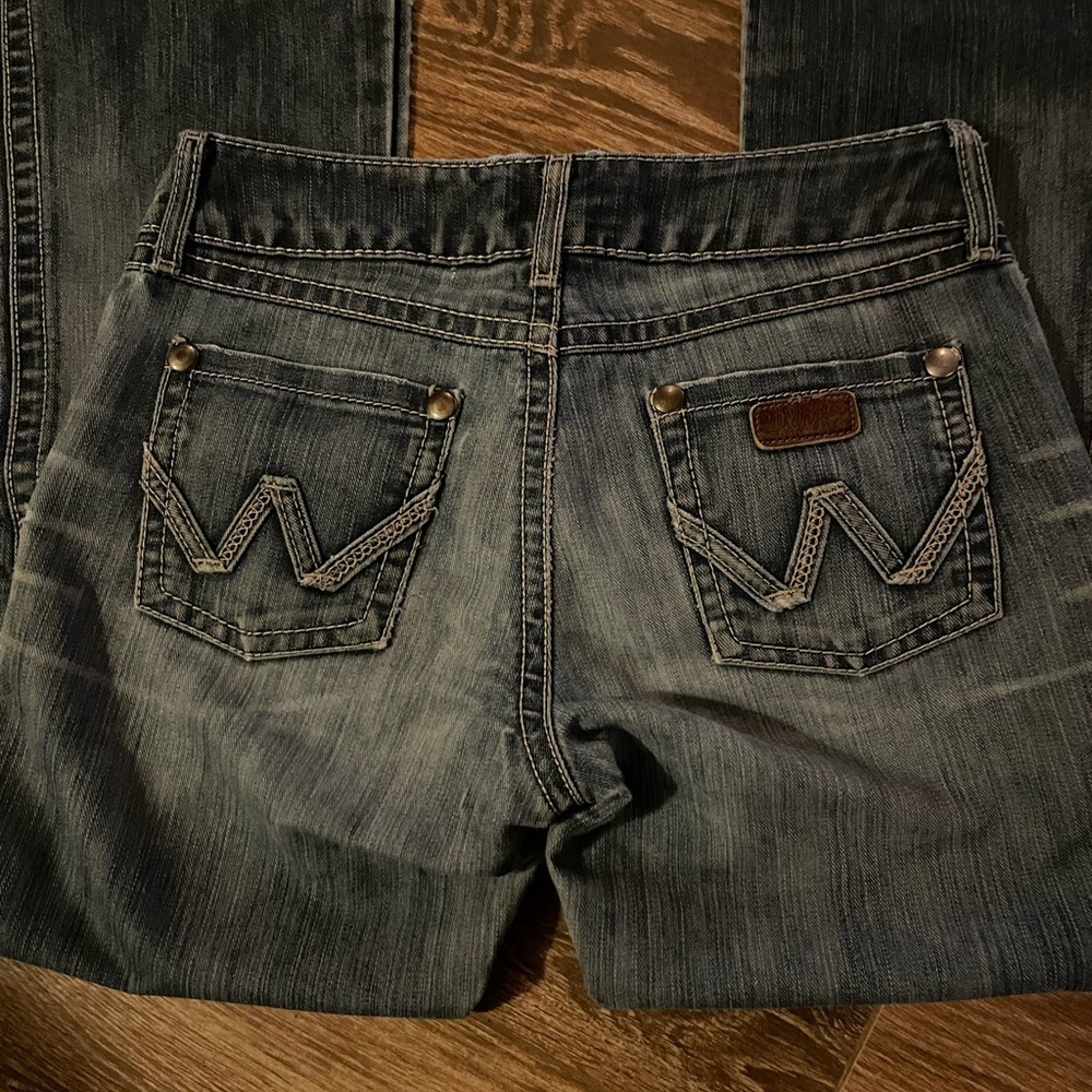 Women's Wrangler Leather Premium Patch Bootcut Jeans Size 3/4 x 30 (cut hem)